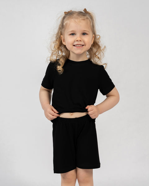 Kids bamboo t-shirt and shorts set in black, breathable and versatile everyday clothing.