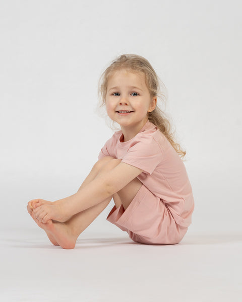 Kids bamboo t-shirt and shorts set in soft pink, breathable and comfortable everyday loungewear.