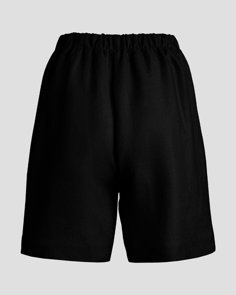 Packshot, der viser bagsiden af hørshorts med høj talje.