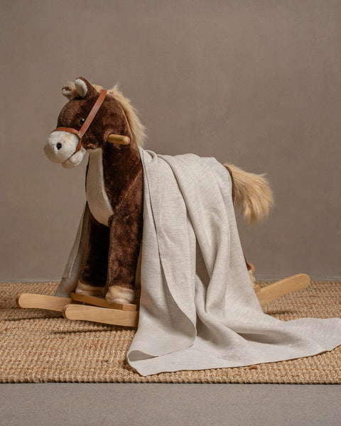 Linnedplaid til baby i naturlig farve